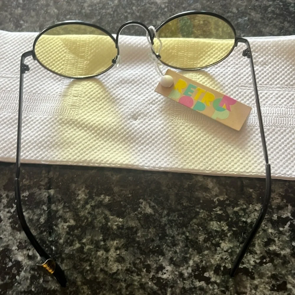 Round Yellow Lens with Silver Frame Sunglasses.
